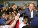 President Bush greets students and faculty with his brother Gov. Jeb Bush R-Fla., following a for Leadership Forum at the Justina Road Elementary School in Jacksonville, Fla., Monday, Sept. 10, 2001. Bush also announced a pair of federal initiatives to improve reading instruction.  (AP Photo/Doug Mills)