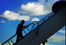 President Bush walks up the steps of Air Force One as he prepares to depart Jacksonville International Airport, in Jacksonville, Fla., Monday, Sept. 10, 2001. Bush urged Congress Monday to set aside partisan bickering and pass his education package so America's teachers can 'wage war on illiteracy in the young.'  (AP Photo/Doug Mills)