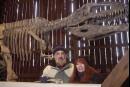 FILE--Barry and April James pose in front of a 48-foot Giganotosaurus replica they assembled in their barn in Sunbury, Pa., Dec. 30, 2001. The couple, charged with stealing dinosaur bones from federal land in Utah and selling them to a Japanese musuem, said they're innocent in an interview Monday, Sept. 10, 2001. (AP Photo/Pat Little, File)