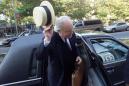 With a tip of the hat, Judge Richard Casey gets into his car at the end of the day on his way to a concert Wednesday, Aug. 15, 2001, outside the U.S. District Courthouse in New York. Casey, a federal judge in Manhattan who is blind, sees humor and joy while dispensing justice. (AP Photo/Beth A. Keiser)