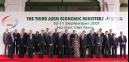 Economic ministers from the Third ASEM Economic Ministers' meeting gather for a group photo in front of the venue in Hanoi Tuesday Sept. 11, 2001. Front row left to right are Finland, Kimmo Kalevi Immeri Sasi, Denmark, Birger Riis Jorgensen, Brunei, Pehin Abdul Rahman Taib, Austria, Martin Bartenstein, EC Trade Commission Pascal Lamay,  China, Sun Zhenyu, Vietnam Prime Minister Phan Van Khai, Malaysia, Rfodaj Aziz, Vietnam, Vu Khoan, Belgium Charles Picque, The UK, Richard Carden  Thailand, Adisai Bodharamik Sweden Leif Pagrotsky Spain, Rodrigo de Rato. second row leftto right is France, Francois Huwart, Germany, Alfred Tacke, Greece, Nicholas Zafiropoulos, Indonesia, Rini Suwandi, Ireland, Tom Kitt  Italy Adolfo Urso Japan Takeo Hiranuma  Korea Doo-Yun Hwang  Luxembourg Henri Grethen Netherlands Mark Dierikx  Philippines Portugal Singapore George Yong-Boon Yeo.(AP Photo/Richard Vogel)