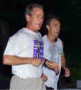 President Bush jogs with a secret service agent during a pre-dawn run at the Longboat Key Club in Sarasota, Fl., Tuesday, Sept. 11, 2001. Bush will visit the at Emma E. Booker Elementary School later this morning. (AP Photo/Doug Mills)