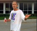 President Bush talks to reporters following a pre-dawn run at the Longboat Key Club in Sarasota, Fl., Tuesday, Sept. 11, 2001. Bush will visit the at Emma E. Booker Elementary School later Tuesday morning.(AP Photo/Doug Mills)