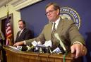 Utah Gov. Michael Leavitt holds a news conference in response to the terrorism attacks on the United States Tuesday, Sept. 11, 2001, in Salt Lake City. Robert Flowers, the commander of Utah's Olympic Public Safety Command stands in the background.  (AP Photo/Douglas C. Pizac)