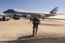 Air Force One sits on the tarmack under tight military security just after President Bush arrived to address the nation from a location the White House does not want known, about the terrorist acts at the World Trade Center and the Pentagon, Tuesday, Sept. 11, 2001. (AP Photo/Doug Mills)