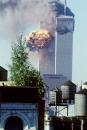 A fireball erupts from one of the World Trade Center towers as it is struck by the second of two airplanes in New York, Tuesday, Sept. 11, 2001. In a horrific sequence of destruction, terrorists hijacked two airliners and crashed them into the World Trade Center in a coordinated series of attacks that brought down the twin 110-story towers. (AP Photo/Todd Hollis)