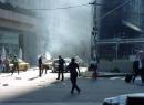 Rescue personnel respond along Liberty Street following the first explosion at New York's World Trade Center following the first explosion Tuesday, Sept. 11, 2001. Planes crashed into the upper floors of both World Trade Center towers minutes apart Tuesday in a horrific scene of explosions and fires that left gaping holes in the 110-story buildings. (AP Photo/Robin L. Marin) MANDATORY CREDIT: ROBIN L. MARIN