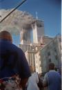 Smoke and flames pour from New York's World Trade Center towers, Tuesday, Sept. 11, 2001. In a horrific sequence of destruction, terrorists crashed two planes into the World Trade Center and the twin 110-story towers collapsed. Explosions also rocked the Pentagon and the State Department and spread fear across the nation. (AP Photo)