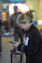 An unidentified air hostess dials a cell phone at the Albuquerque Sunport in Albuquerque, N.M., Tuesday Sept. 11, 2001, after learning about the terrorist attack on the World Trade Center. All commercial flights in the United States were grounded.  (AP Photo/Pat Vasquez-Cunningham)