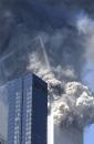 SECOND IN A SERIES OF FOUR PHOTOS--The south tower of the World Trade Center begins to collapse following a terrorist attack on the New York landmark Tuesday, Sept. 11, 2001. (AP Photo/Amy Sancetta)