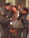 FILE-- Two New York City police officers help an injured woman away from the lobby at the World Trade Center in this Feb. 26, 1993 file photo after an explosion.  In one of the most horrifying attacks ever against the United States, terrorists crashed two airliners into the World Trade Center in a deadly series of blows Tuesday, Sept. 9, 2001, that brought down the twin 110-story towers. A plane also slammed into the Pentagon as the government itself came under attack.  (AP Photo/Joe Tabacca)