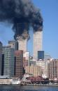 ONE OF FIVE PHOTOS--The south tower collapses as smoke billows from both towers of the World Trade Center, in New York, Tuesday, Sept. 11, 2001. In one of the most horrifying attacks ever against the United States, terrorists crashed two airliners into the World Trade Center in a deadly series of blows that brought down the twin 110-story towers. (AP Photo/Jim Collins)