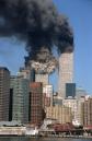 TWO OF FIVE PHOTOS--The south tower collapses as smoke billows from both towers of the World Trade Center, in New York, Tuesday, Sept. 11, 2001. In one of the most horrifying attacks ever against the United States, terrorists crashed two airliners into the World Trade Center in a deadly series of blows that brought down the twin 110-story towers. (AP Photo/Jim Collins)