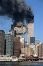 THREE OF FIVE PHOTOS--The south tower collapses as smoke billows from both towers of the World Trade Center, in New York, Tuesday, Sept. 11, 2001. In one of the most horrifying attacks ever against the United States, terrorists crashed two airliners into the World Trade Center in a deadly series of blows that brought down the twin 110-story towers. (AP Photo/Jim Collins)