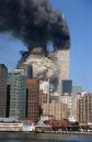 FOUR OF FIVE PHOTOS--The south tower collapses as smoke billows from both towers of the World Trade Center, in New York, Tuesday, Sept. 11, 2001. In one of the most horrifying attacks ever against the United States, terrorists crashed two airliners into the World Trade Center in a deadly series of blows that brought down the twin 110-story towers. (AP Photo/Jim Collins)