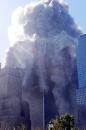 The north tower of New York's World Trade Center explodes as it begins to collapse after terrorists crashed two airplanes in the twin towers Tuesday Sept. 11, 2001. (AP Photo/Richard Drew)