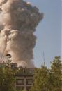 THIRD IN A SERIES OF THREE--This is the third in a series of three images showing the northern tower of the World Trade Center collapsing in New York, Tuesday, Sept. 11, 2001. (AP Photo/Ernesto Mora)