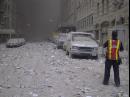 Ash covers a street in downtown New York City after the collapse of the World Trade Center following a terrorist attack Tuesday, Sept. 11, 2001. (AP Photo/Bernadette Tuazon)