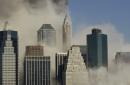 This is a view of the Manhattan skyline as seen from Brooklyn after the collapse of the World Trade Center towers, Tuesday, Sept. 11, 2001, in New York. (AP Photo/Kathy Willens)