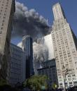 The south tower of the  World Trade Center collapses after a terrorist attack on the New York landmark Tuesday, Sept. 11, 2001. (AP Photo/Amy Sancetta)