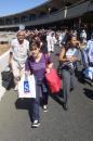 Stranded travelers and employees move away from Terminal C at Newark International Airport after the airport was closed following the attack on the World Trade Center in New York, N.Y., Sept. 11, 2001.   (AP Photo/Gene Boyars)