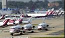 Passenger aircraft at Lambert-St. Louis International Airport in St. Louis sit idle at gates and on taxiways Tuesday, Sept. 11, 2001. The Federal Aviation Administration ordered all outbound flights grounded following the fiery twin disaster at the World Trade Center around 9 a.m. The FAA said the ban would not be lifted until Wednesday at noon EST, at the earliest. (AP Photo/James A. Finley)