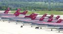 Grounded Northwest Airlines planes sit on the tarmac at the Minneapolis-St. Paul Airport after they were grounded along with all airlines following the attacks on the World Trade Center and the Pentagon Tuesday, Sept. 11, 2001, in Minneapolis. (AP Photo/Jim Mone)