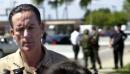 Adm. Robert J. Natter, Cmd. in Chief of the U.S. Atlantic Fleet, talks to the media outside Norfolk Naval Station in Norfolk, Va., Tuesday, Sept. 11, 2001, about placing units under his command on the highest level of alert, after the apparent terrorist attacks in New York and Washington Tuesday.  (AP Photo/Gary C. Knapp)