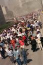 Evacuees walk across the Brooklyn Bridge from downtown Manhattan where earlier two hijacked airliners crashed into the World Trade Center and brought down the twin 110-story towers Tuesday, Sept. 11, 2001. A jetliner also slammed into the Pentagon as the seat of government itself came under attack.  (AP Photo/Jim Collins)