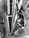 FILE--Wreckage protrudes from the large hole in the north side of the Empire State Building at the 78th and 79th floors in  New York City on July 28, 1945.   A U.S. B-25 army bomber crashed into the structure in the fog.  The photographer took this photo from a ledge on the 81st floor looking down on 34th St.  Terrorists crashed two hijacked airliners into the World Trade Center and brought down the twin 110-story towers Tuesday morning, Sept. 11, 2001.   (AP Photo/John Lindsay)