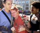 Janet Hobson, center, is comforted by Francis Cueto, left, and Charelle Shaw after terrorists crashed two planes into New York's World Trade Center Tuesday, Sept. 11, 2001. Hobson said that her friend was in the World Trade Center. (AP Photo/Matt Moyer)