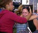 Lisa Bianco, left, comforts two unidentified women near New York's World Trade Center after terrorists crashed two planes into the landmark buildings Tuesday, Sept. 11, 2001. (AP Photo/Matt Moyer)