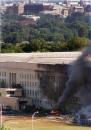 Smoke billows from the Pentagon Tuesday, Sept. 11, 2001 after a direct hit on the building by an aircraft. (AP Photo/Tom Horan)