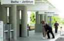 Officer R. Monroe of the Ontario Airport Police searches an unidentified man in front of Ontario International Airport in Ontario, Calif., on Tuesday Sep. 11, 2001. The man who was just curious to why the airport was shut down, was escorted off airport property as security was stepped up due to the attacks in New York and the Pentagon. (AP Photo/Doug Benc)