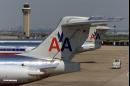 American Airlines planes are parked at Dallas-Fort Worth International Airport in Grapevine, Texas, Tuesday, Sept. 11, 2001. American Airlines said two of its planes carrying a total of 156 people crashed Tuesday, but would not confirm one crashed into the World Trade Center and the other at the Pentagon. (AP Photo/Donna McWilliam)