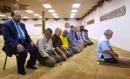 Prayer leader Abdul Hamid Youness, right, leads a group of worshippers in their daily noon prayer at the Islamic Center of Southern California in Los Angeles, Tuesday, Sept. 11, 2001.  The prayer included words for those killed in terrorist attacks against the United States, Tuesday.  (AP Photo/Kevork Djansezian)