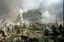 Firefighters make their way through the rubble after terrorists crashed two airliners into the World Trade Center in a deadly series of blows Tuesday that brought down the twin 110-story towers in New York Tuesday, Sept. 11, 2001. (AP Photo/Shawn Baldwin)