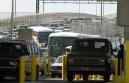 Motorists wait in long lines to enter into the United States from Juarez, Mexico, Tuesday, Sept. 11, 2001, into El Paso, Texas. Tightened security caused huge traffic jams at the American border with Mexico on Tuesday, as U.S. agents braced for a possible border closure after terrorist attacks in the United States. (AP Photo/Gregory Bull)