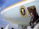 President Bush walks off the steps of Air Force One at Offutt Air Force Base near Omaha, Neb., to have a National Security breifing about the two planes that crashed into the World Trade Center in New York, Tuesday, Sept. 11, 2001. (AP Photo/Doug Mills)