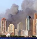 The remaining lower floors of the decimated World Trade Center rise from clouds of smoke in lower Manhattan, New York, Tuesday, Sept. 11, 2001. In the most devastating terrorist onslaught ever waged against the United States, hijackers crashed two airliners into the World Trade Center on Tuesday, toppling its twin 110-story towers. (AP Photo/Jeff Zelevansky)