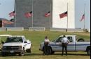 Flags fly at half-staff at the Washington Monument Tuesday, Sept. 11, 2001 in honor of lives lost in the apparent terrorist attacks in New York and at the Pentagon. (AP Photo/Evan Vucci)