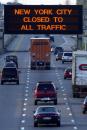 A sign on the New York State Thruway Tuesday, Sept. 11, 2001 in Buffalo, N.Y., warns motorists that New York City is closed to all traffic after terrorist attacks on the World Trade Center. (AP Photo/David Duprey)