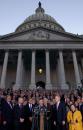 From front left: Rep. Dick Armey, R-Texas, Sen. Harry Reid, D-Nev., Sen. Trent Lott, R-Miss., Senate Minority Leader, Sen. Tom Daschle, D-S.D., Senate Majority Leader, House Speaker Dennis Hastert, R-Ill., Rep. Richard Gephardt, House Minority Leader, Sen. Barbara Mikulski, D-Md., and other congressional members stand together on the steps of the Capitol to show unity, Tuesday, Sept. 11, 2001, in Washington, after a day which saw two planes crashes into the World Trade Center in New York, and one into the Pentagon, all considered acts of terrorism. (AP Photo/Kenneth Lambert)