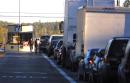 Traffic going into Elmendorf Air Force Base in Anchorage, Alaska, is backed up Tuesday, Sept. 11, 2001, as U.S. Air Force security personnel check IDs after the base went on the highest security level due to terrorists attacks on U.S. soil.  All military bases in Alaska are on high security and all major air traffic in Alaska is suspended. (AP Photo/Al Grillo)