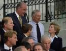 Members of both houses of Congress gather on the steps of the Capitol in Washington Tuesday, Sept. 11, 2001, to show unity in the wake of terrorist acts in Washington and New York. In the back row are Sen. Hillary Rodham Clinton, D- N.Y., right, Sen. Jim Jeffords, I-Vt., center, and Sen. Fred Thompson, R-Tenn. (AP Photo/Dennis Cook)