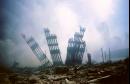 The remains of the World Trade Center stands amid the debris following the terrorist attack on the building in New York, Tuesday, Sept. 11, 2001. (AP Photo/Alex Fuchs)