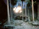 Firefighters work amid the destruction in the atrium of the World Financial Center, across the street from the twin towers of New York's World Trade Center, after a terrorist attack on the lower Manhattan landmarks Tuesday, Sept. 11, 2001. (AP Photo/Alex Fuchs)