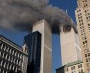 Smoke pours from one of the towers of the World Trade Center Tuesday, September 11, 2001, after terrorists crashed a plane into the building.  Minutes later a second plane was crashed into the second tower. (AP Photo/Chao Soi Cheong)