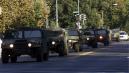 A convoy of military police arrives in Washington near the U.S. Capitol Tuesday, Sept. 11, 2001. Government agencies were closed and security was high after the New York and Washington terrorist bombings. (AP Photo/Joe Marquette)