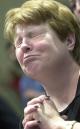 Karen Scienksi cries while praying during a vigil service at the International Church of Las Vegas in Las Vegas, Tuesday, Sept. 11, 2001. The church held an open house for people to pray for the victims of the terrorist attacks against the World Trade Center and the Pentagon. (AP Photo/Laura Rauch)